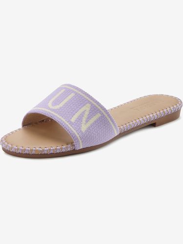 Jolies mules avec inscription et design tendance - LASCANA - Modalova