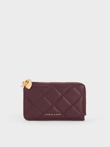 Porte-monnaie matelassé zippé à breloque en forme de cœur Arrietty - Charles & Keith - Modalova