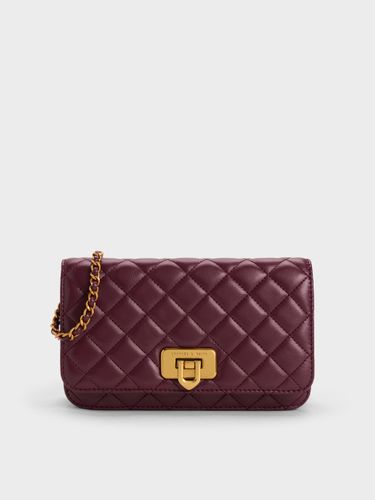 Pochette matelassée à fermoir tournant Cressida - Charles & Keith - Modalova