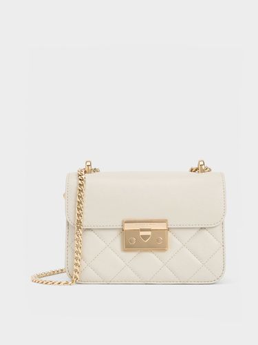 Charles & Keith - Sac matelassé à bouton-poussoir et poignée en chaîne - Charles & Keith - Modalova