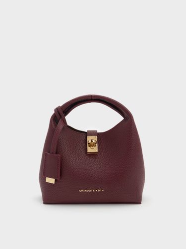 Mini Chance Turn-Lock Bucket Bag - Charles & Keith - Modalova
