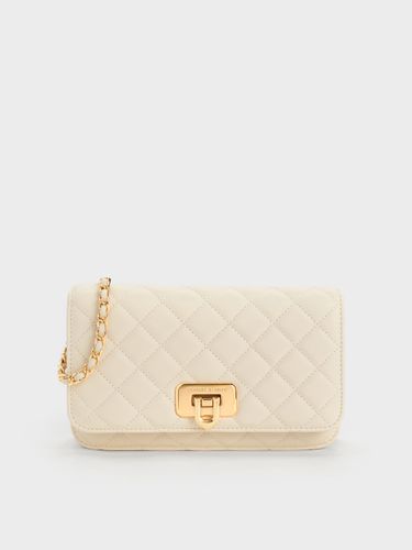 Pochette matelassée à bouton-poussoir Cressida - Charles & Keith - Modalova