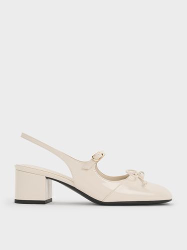 Charles & Keith - Escarpins Mary Jane vernis à bride arrière ornés d'une perle et d'un nœud - Charles & Keith - Modalova