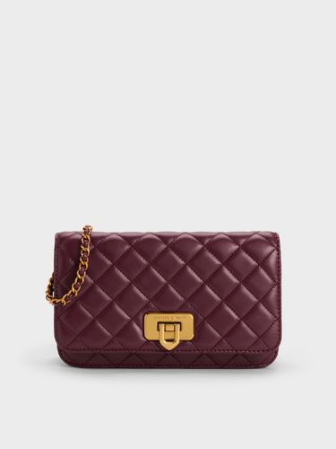 Pochette matelassée à fermoir tournant Cressida - Charles & Keith - Modalova