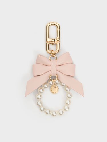 Breloque de sac nœud et perles Halsey - Charles & Keith - Modalova