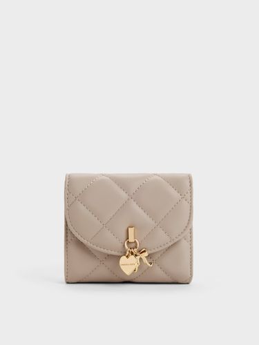 Portefeuille à rabat incurvé matelassé Arrietty - Charles & Keith - Modalova