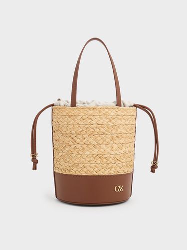 Charles & Keith - Sac seau en cuir et raphia - Charles & Keith - Modalova