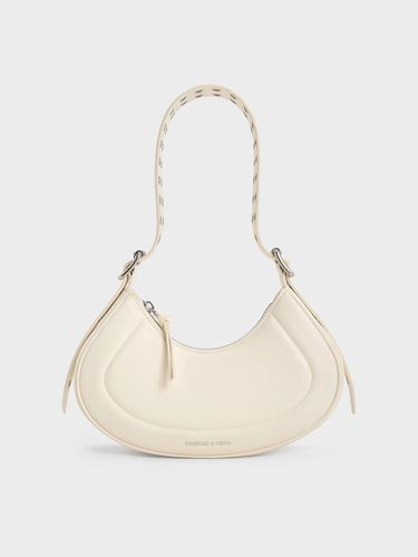 Charles & Keith - Sac porté épaule incurvé à lanière à œillets Petra - Charles & Keith - Modalova