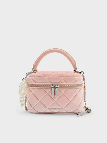 Vanity case matelassée en velours à poignée sur le dessus Arwen - Charles & Keith - Modalova