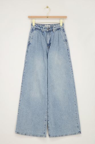 Jean large à plis en denim | - My jewellery - Modalova