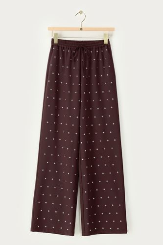 Pantalon foncé avec clous argentés | - My jewellery - Modalova