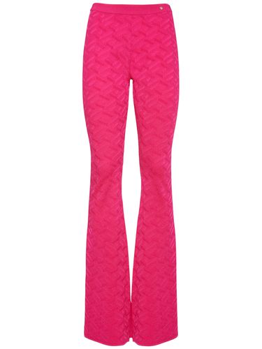 Pantalon Évasé En Maille De Viscose Jacquard - VERSACE - Modalova