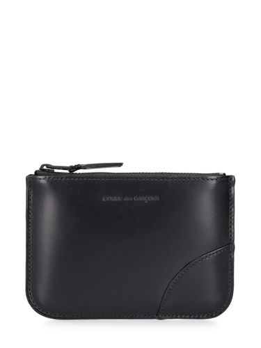 Pochette En Cuir Very Black - COMME DES GARÇONS WALLET - Modalova