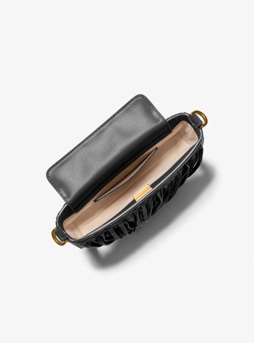 MK Petite pochette Bryant convertible en daim à franges - Michael Kors - MICHAEL Michael Kors - Modalova