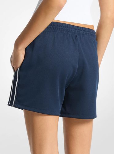 MK Shorts de survêtement en piqué avec logo graphique et bordure contrastée - Michael Kors - MICHAEL Michael Kors - Modalova