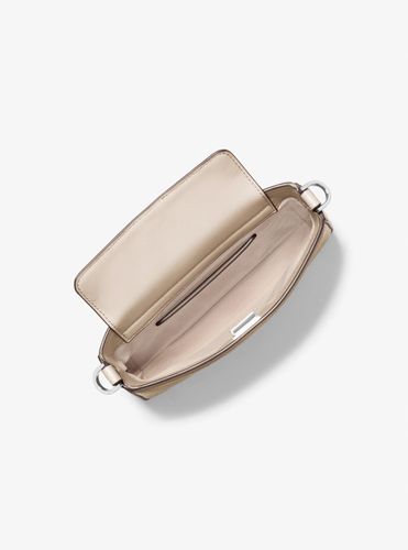 MK Petite pochette Bryant convertible en cuir grainé - Michael Kors - MICHAEL Michael Kors - Modalova