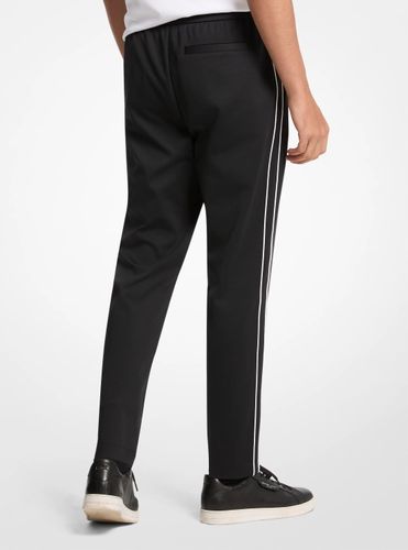 MK Pantalon de survêtement en nylon extensible à passepoils contrastés - Michael Kors - Michael Kors Mens - Modalova
