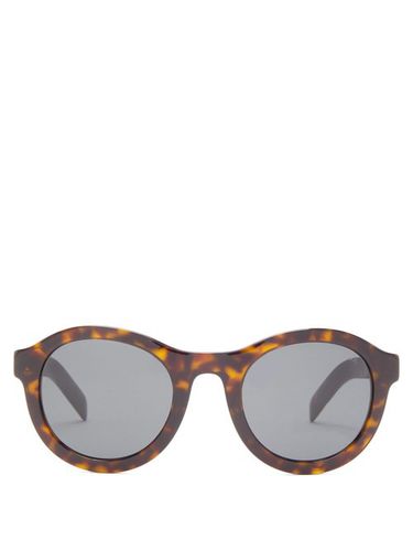 Lunettes de soleil rondes effet écaille de tortue - Prada Eyewear - Modalova