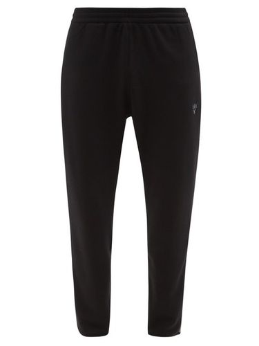 Pantalon de jogging en jersey à bandes latérales - South2 West8 - Modalova