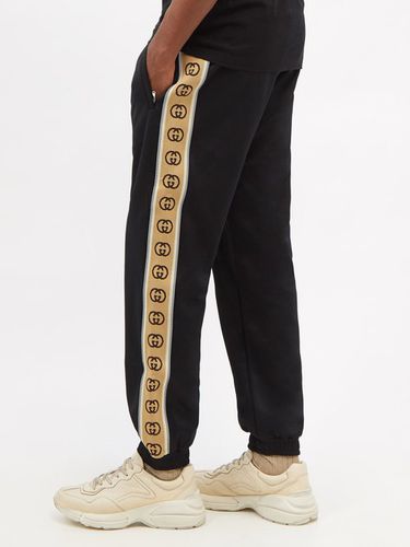 Pantalon de jogging en jersey à logo GG - Gucci - Modalova