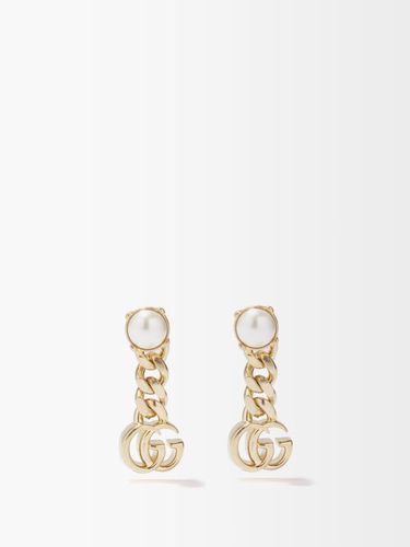 Boucles d'oreilles façon perle et logo GG - Gucci - Modalova