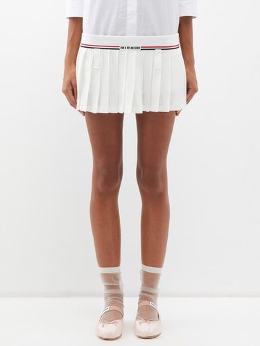 Mini-jupe de tennis en jersey technique plissé - Miu Miu - Modalova