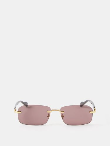 Lunettes de soleil rectangulaires en métal - Gucci Eyewear - Modalova
