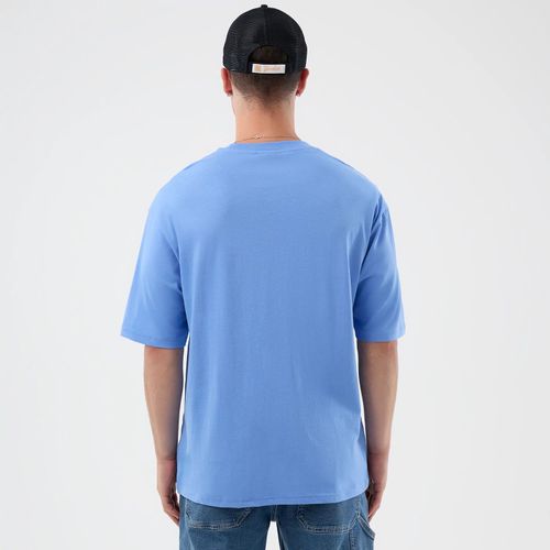T-shirt New Era Basketball Character Graphic Bleu Pastel unisex - New Era Cap - Modalova