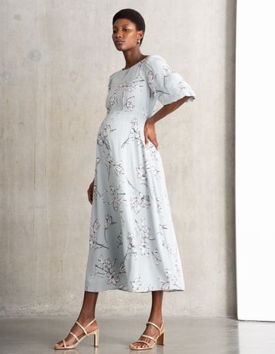 Robe longue de maternité, avec une taille froncée et une élégante gravure en forme de tulipe - Seraphine - Modalova