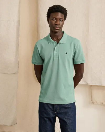 Polo piqué clair coton recyclé - FAGUO - Modalova