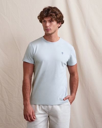 Tshirt bleu ciel brodé arbre - FAGUO - Modalova