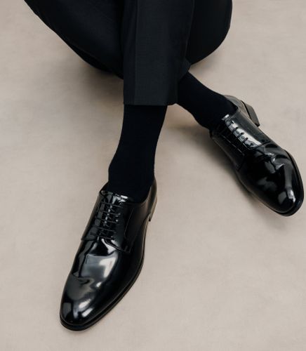 Chaussures derby en cuir vernis - IZAC - Modalova