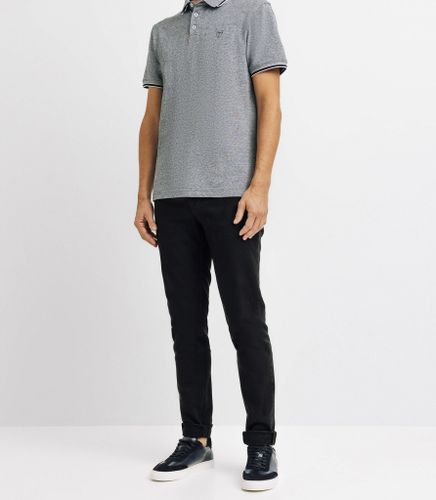 Polo piqué avec broderie marine - IZAC - Modalova