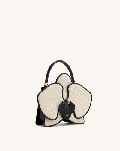 Flora Sac à main à anse supérieure en forme d'orchidée - Toile noir et blanc - JW PEI - Modalova