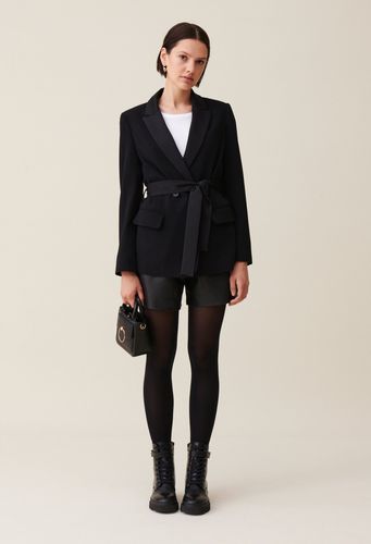 Veste tailleur boutonnée ceinturée - Claudie Pierlot - Modalova