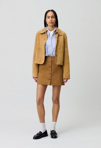 Jupe courte à boutons - Claudie Pierlot - Modalova