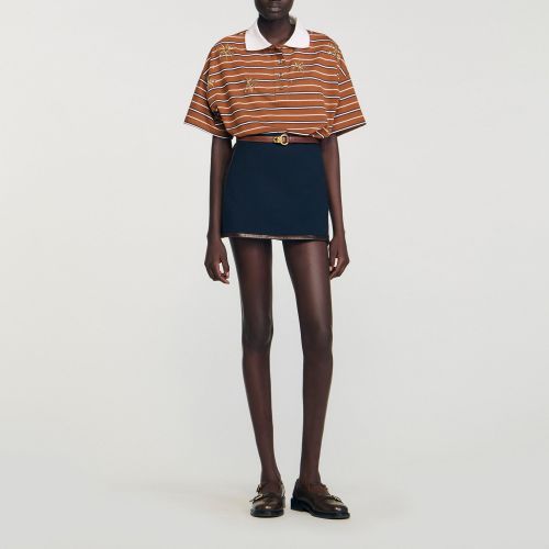 Jupe courte à bandes en cuir - Sandro Paris - Modalova