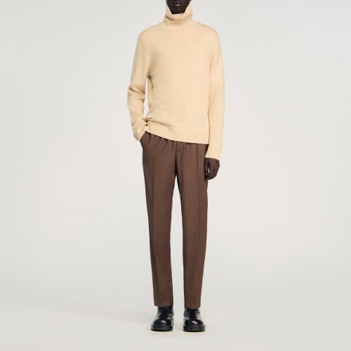 Pantalon élastiqué en laine - Sandro Paris - Modalova