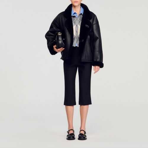Manteau court en peau lainée - Sandro Paris - Modalova