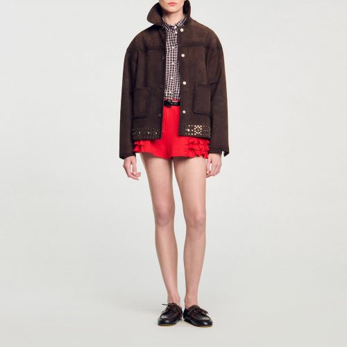 Veste en cuir suède ornée de studs - Sandro Paris - Modalova