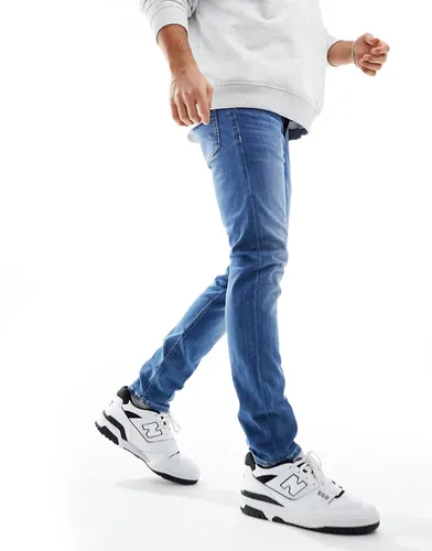 Jean skinny à délavage moyen - Calvin Klein Jeans - Modalova