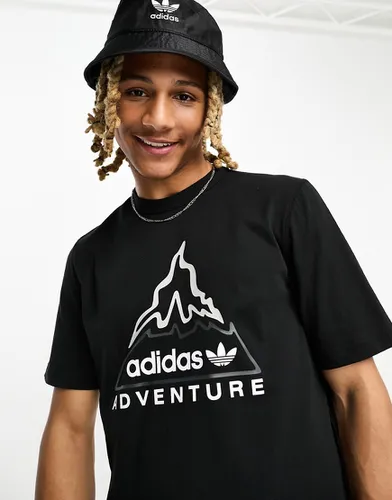 Adventure - T-shirt à imprimé volcan - Adidas Originals - Modalova