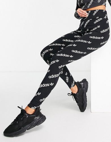 Logomania - Legging avec logo répété - Adidas Originals - Modalova