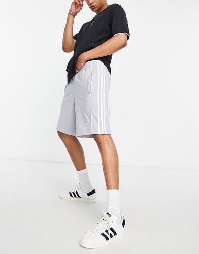 Rekive - Short à logo et 3 bandes - Adidas Originals - Modalova