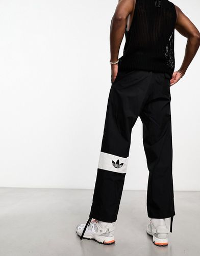 Rifta - Pantalon cargo à logo color block - Adidas Originals - Modalova