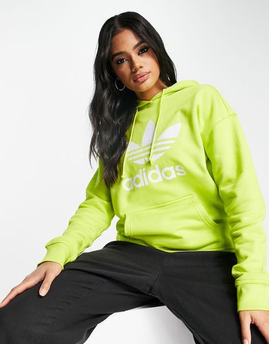 Sweat à capuche à grand logo - Citron vert - Adidas Originals - Modalova