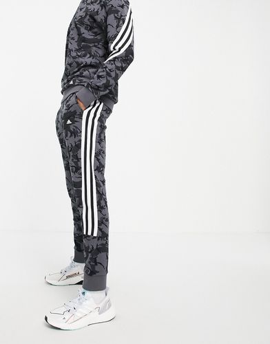 Adidas Training - Jogger à trois bandes - camouflage - Adidas Performance - Modalova