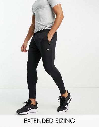 Pantalon de jogging super skinny emblématique en tissu à séchage rapide - Asos 4505 - Modalova