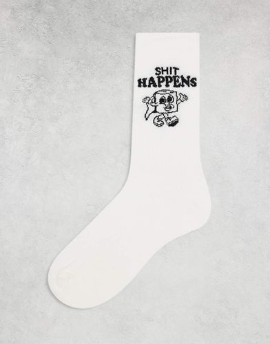 Chaussettes à motif papier toilette et slogan Shit happens » - Asos Design - Modalova