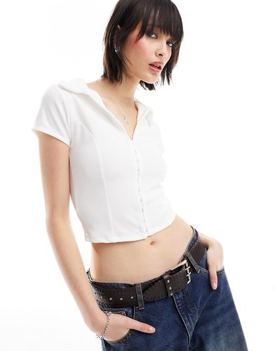 Chemise courte à agrafes, manches courtes et surpiqûre - Asos Design - Modalova